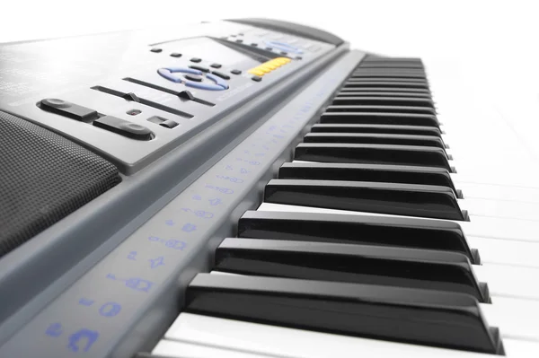 Keys of a synthesizer in white bright li — Stock Photo, Image