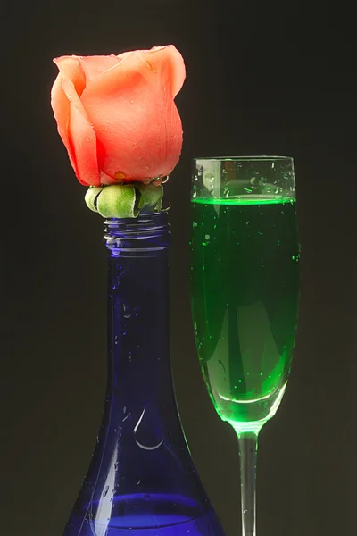 Rose with a cocktail. — Stock Photo, Image