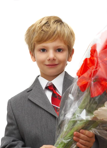 Le garçon avec un bouquet de couleurs — Photo