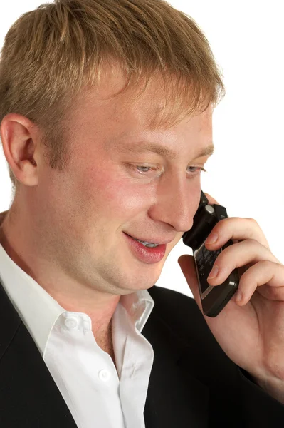 De zakenman spreekt via de telefoon. gedrag — Stockfoto