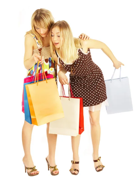 Twee meisjes met tassen. — Stockfoto