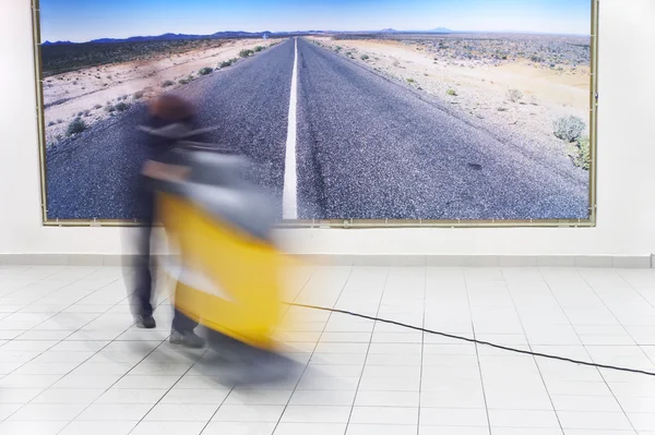 stock image The person vacuums a floor