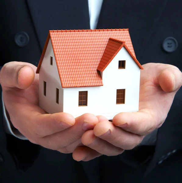 The house in a hand — Stock Photo, Image