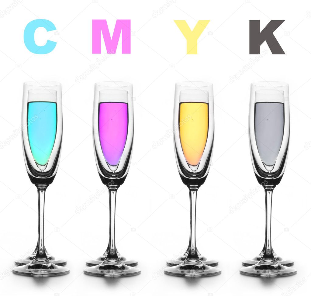 Four glasses with a different liquid on