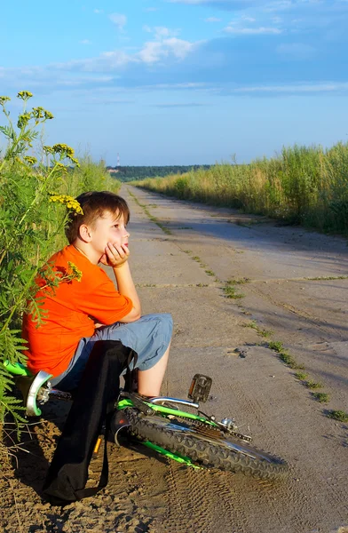 stock image The boy on road