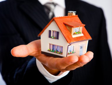 House in a hand clipart