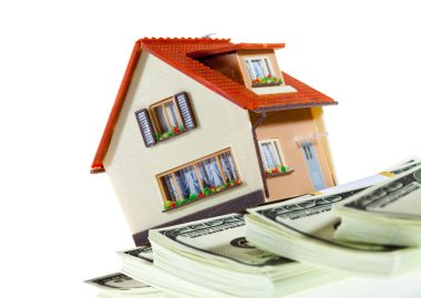 House on packs of banknotes clipart