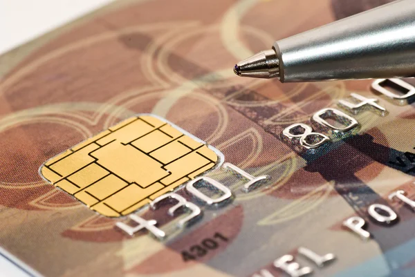 Cartão de crédito e caneta macro — Fotografia de Stock