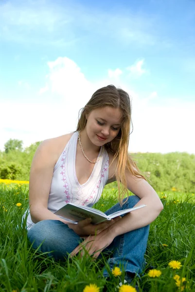 Stock image Young girl rearing book