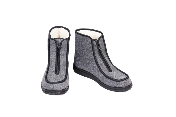 Winter grijs schoenen op een wit. — Stockfoto