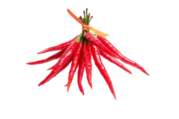 Funny peppers connected by ribbon on a — Stock Photo, Image