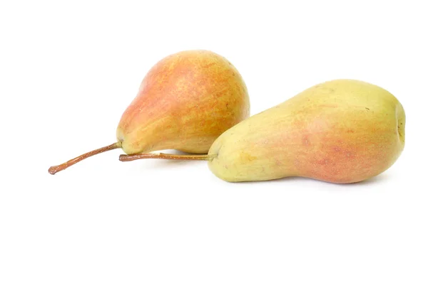 Två mogna päron på en vit. — Stockfoto