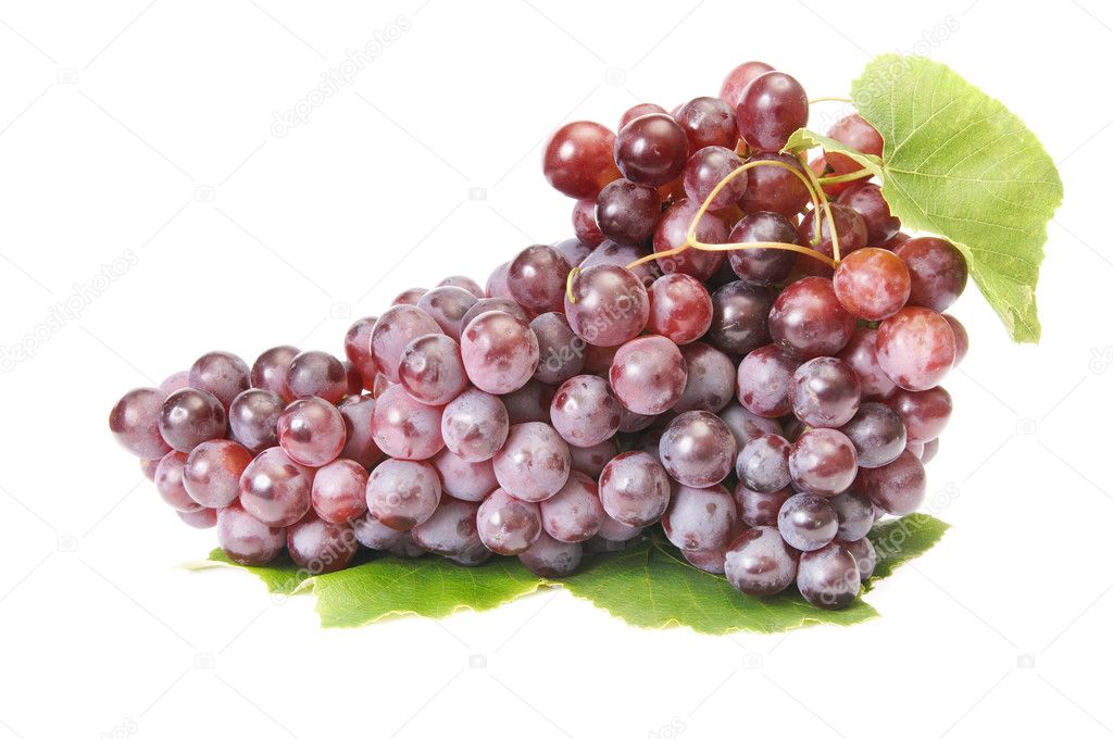 Ripe,tasty grapes on a white.