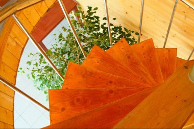 Spiral staircase in the modern wooden clipart