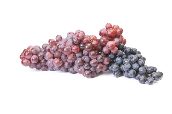 Uvas maduras e suculentas em um branco . — Fotografia de Stock