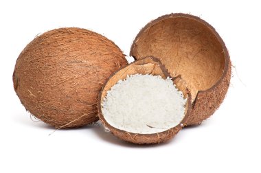 Whole and broken coconut on a white. clipart