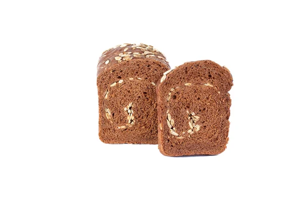 Rye bread full of seeds on a white backg — Stock Photo, Image