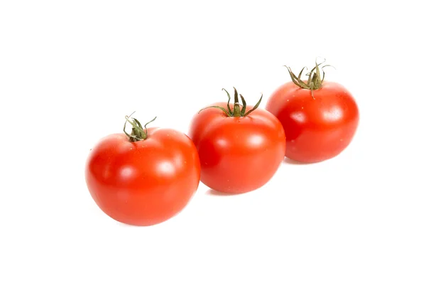 stock image Three tomatos.