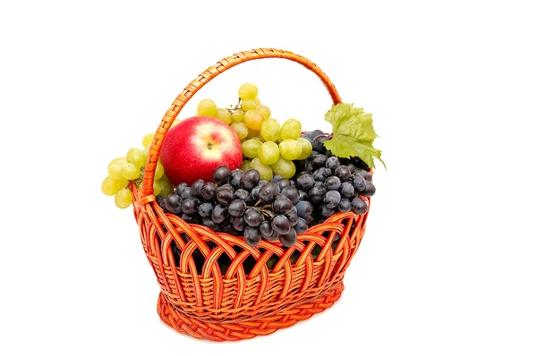 Bunches of grapes and apples in basket. — Stock Photo, Image