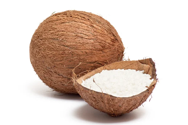 Partie de noix de coco avec poudre à l'intérieur de la coque — Photo