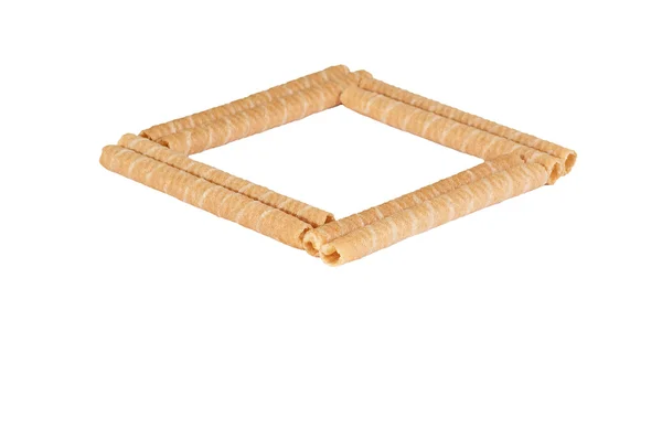 Quadrato realizzato con biscotto su uno schienale bianco — Foto Stock