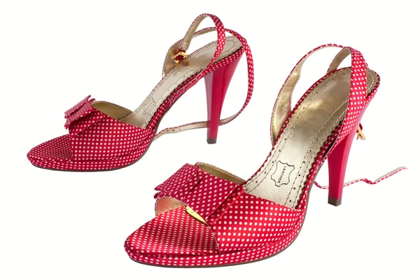 Röda sandaler i ärter 2 — Stockfoto