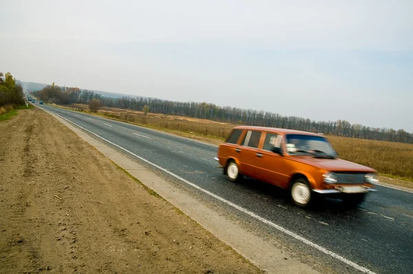 Machine on the road — Stock Photo, Image