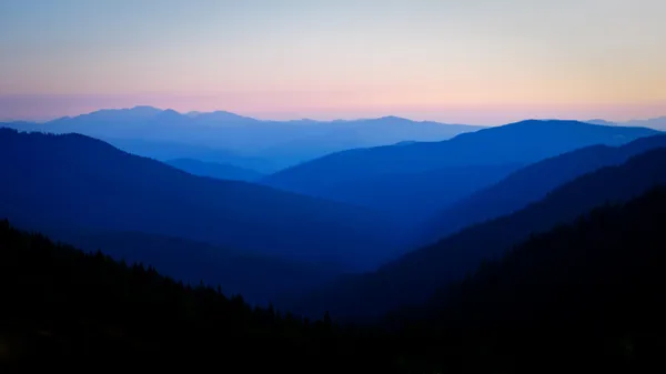 Схід сонця над горами Стокове Фото