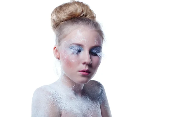 Portret van een jong meisje in sneeuw — Stockfoto