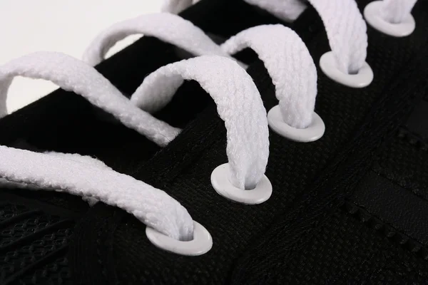 Белые шнурки — стоковое фото