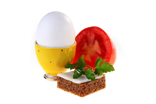 Egg in a yellow support — Stock Photo, Image