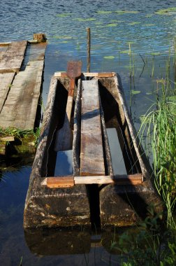 Old traditional fishing boat at a berth clipart