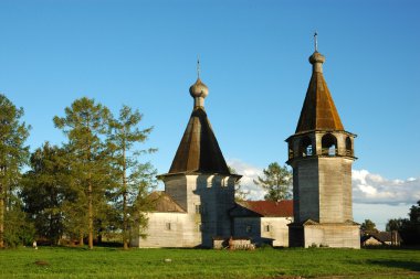 Wooden russian country church and belfry clipart