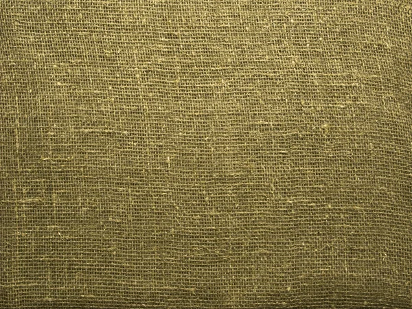 Hrubé hnědé textilní pozadí — Stock fotografie
