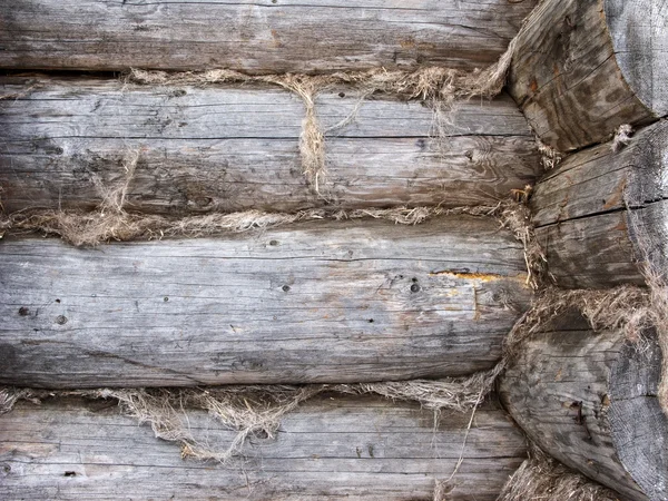 Kanten av den gamle tømmerveggen – stockfoto