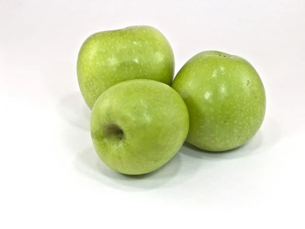 Três maçãs no fundo branco — Fotografia de Stock