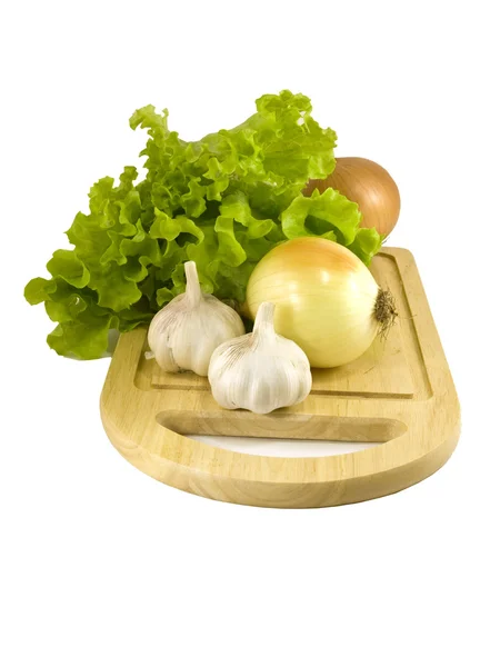 Zöldségek a daraboló-board — Stock Fotó