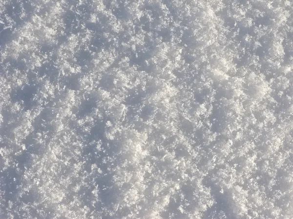 Хрустальная поверхность снега — стоковое фото