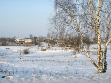 Winter landscape of small village clipart