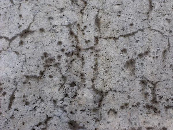 Трещины на бетонном фоне — стоковое фото