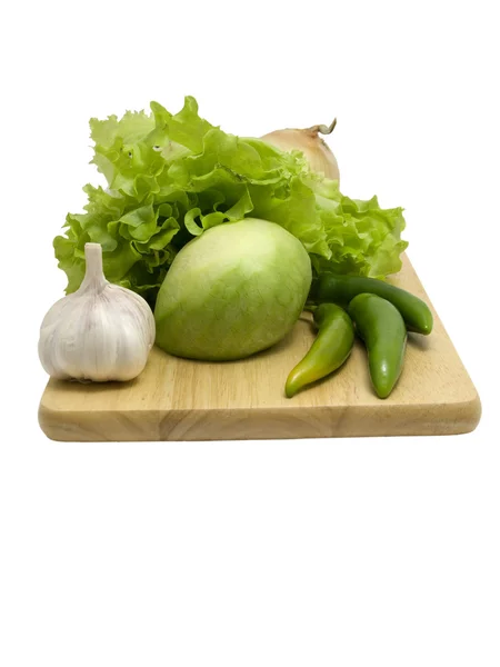 Légumes sur planche à découper — Photo