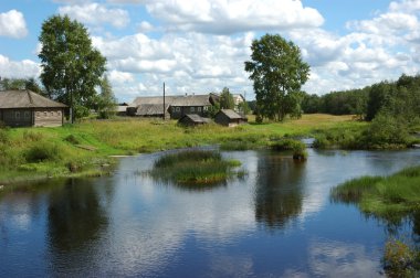 Northern russian village Oshevensk clipart