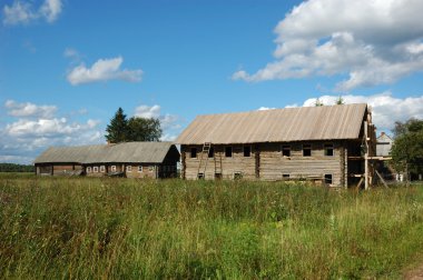 Old wooden house under construction clipart