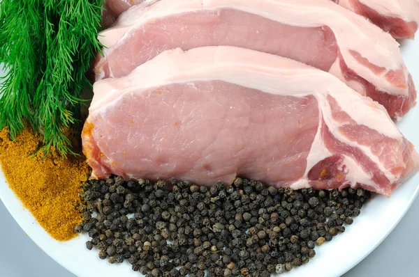 Pork Loin Pieces On Plate Stock Image