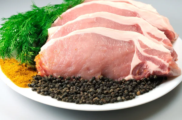 Pork Loin Pieces On Plate Stock Picture