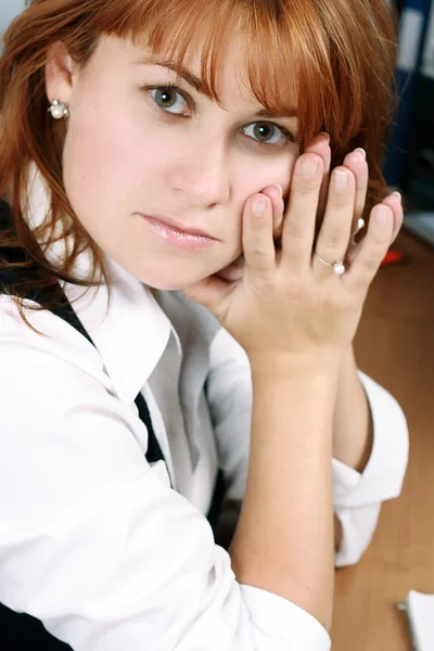 A woman looks tired — Stock Photo, Image