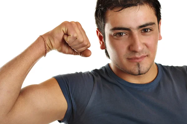 A bronze man is demonstrating his biceps — Stock Photo, Image