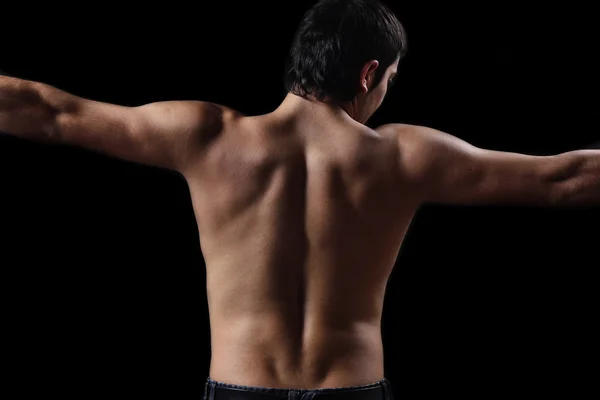 Um ajuste, costas masculinas musculares — Fotografia de Stock