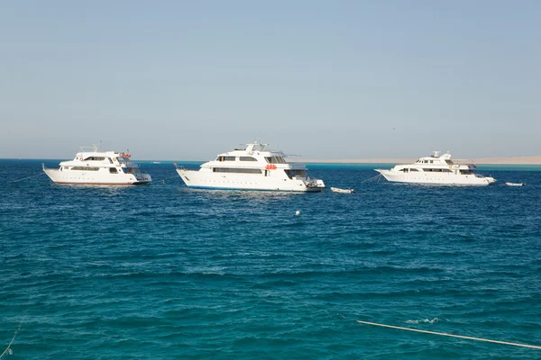 stock image Three boats in the sea