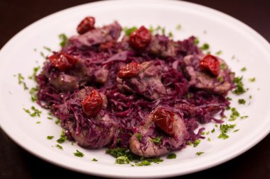 Meat with red cabbage and crandberry clipart